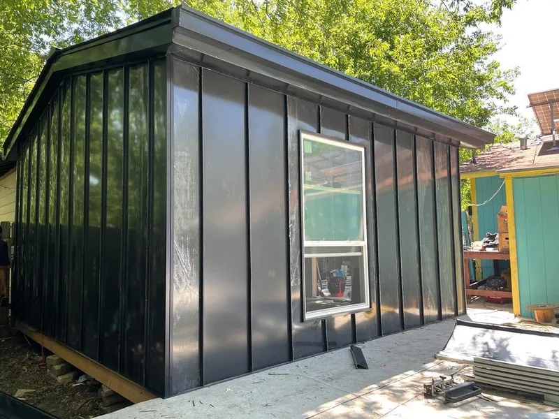 Black standing seam metal wall panels for Metal Roof Installation in Killingworth