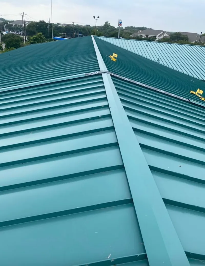 Green commercial metal roof ridge and valley for Metal Roof Repair in Killingworth