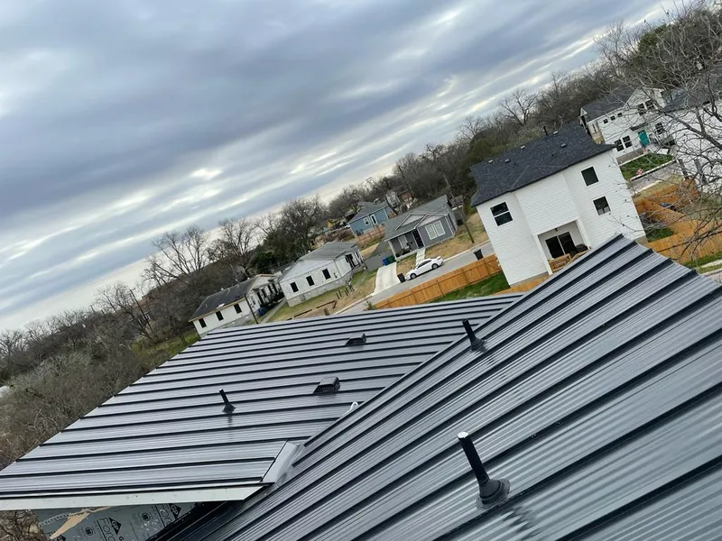 Standing seam metal roof panels with vents for Skylight Repair in Killingworth